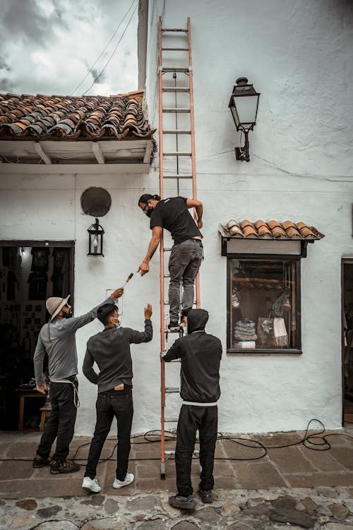 Nick Alvarado and crew on a Fresno tile roof